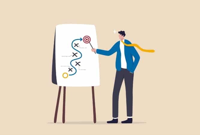 a businessman points to a poster board with for x's leading to a target
