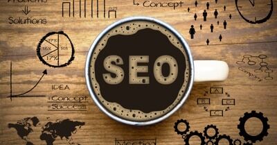 aerial view of a coffee mug with the words seo in the coffee