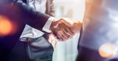 two men shaking hands