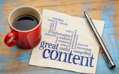 napkin and coffee with words great content