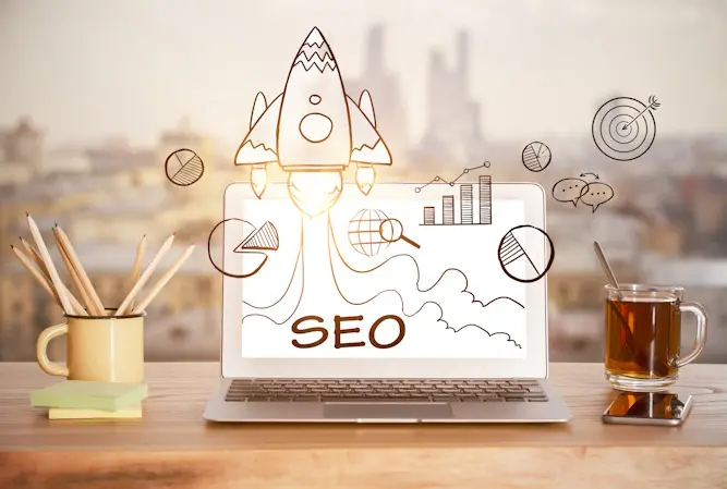 seo graphics around laptop