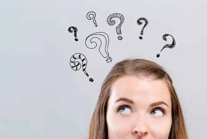 woman with sketched question marks above head